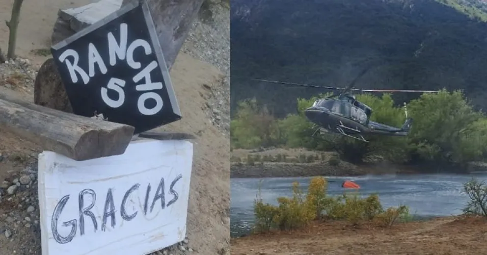El cartel de agradecimiento, sobre la costa del río para que sea visto por el piloto y su asistente.