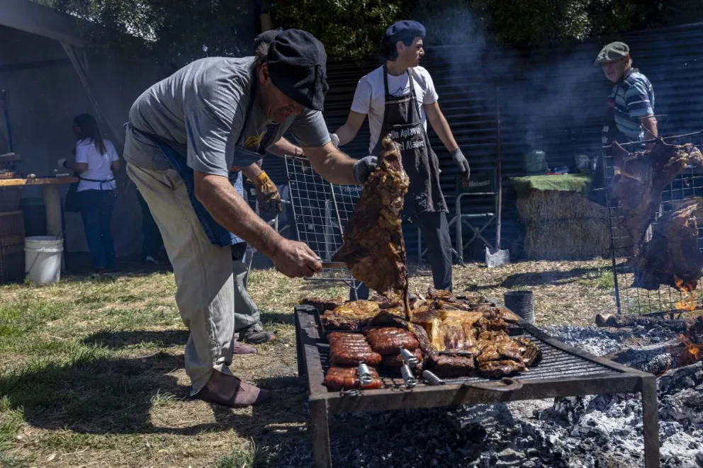 Al calor de las brasas (fotos: Eugenia Neme).