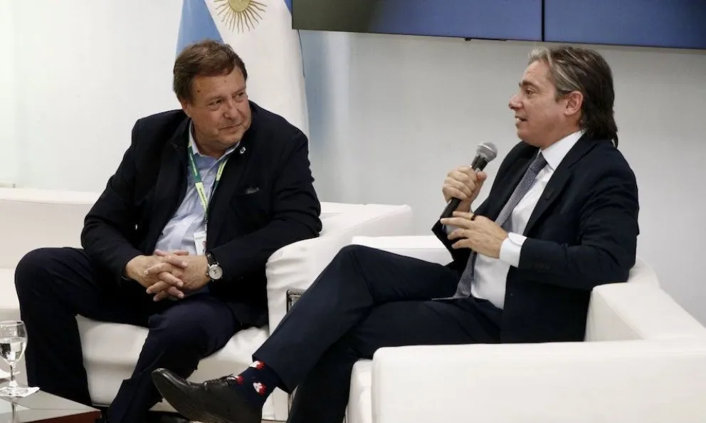 Christian Assinelli junto al gobernador Weretilneck. 
